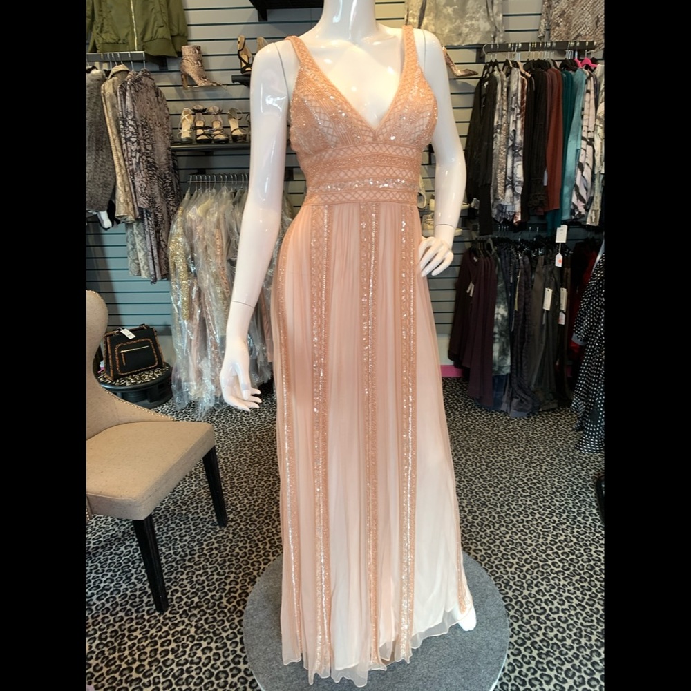 Peach beaded v neck gown
